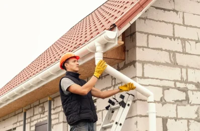 Pose et remplacement de gouttières à Écorches